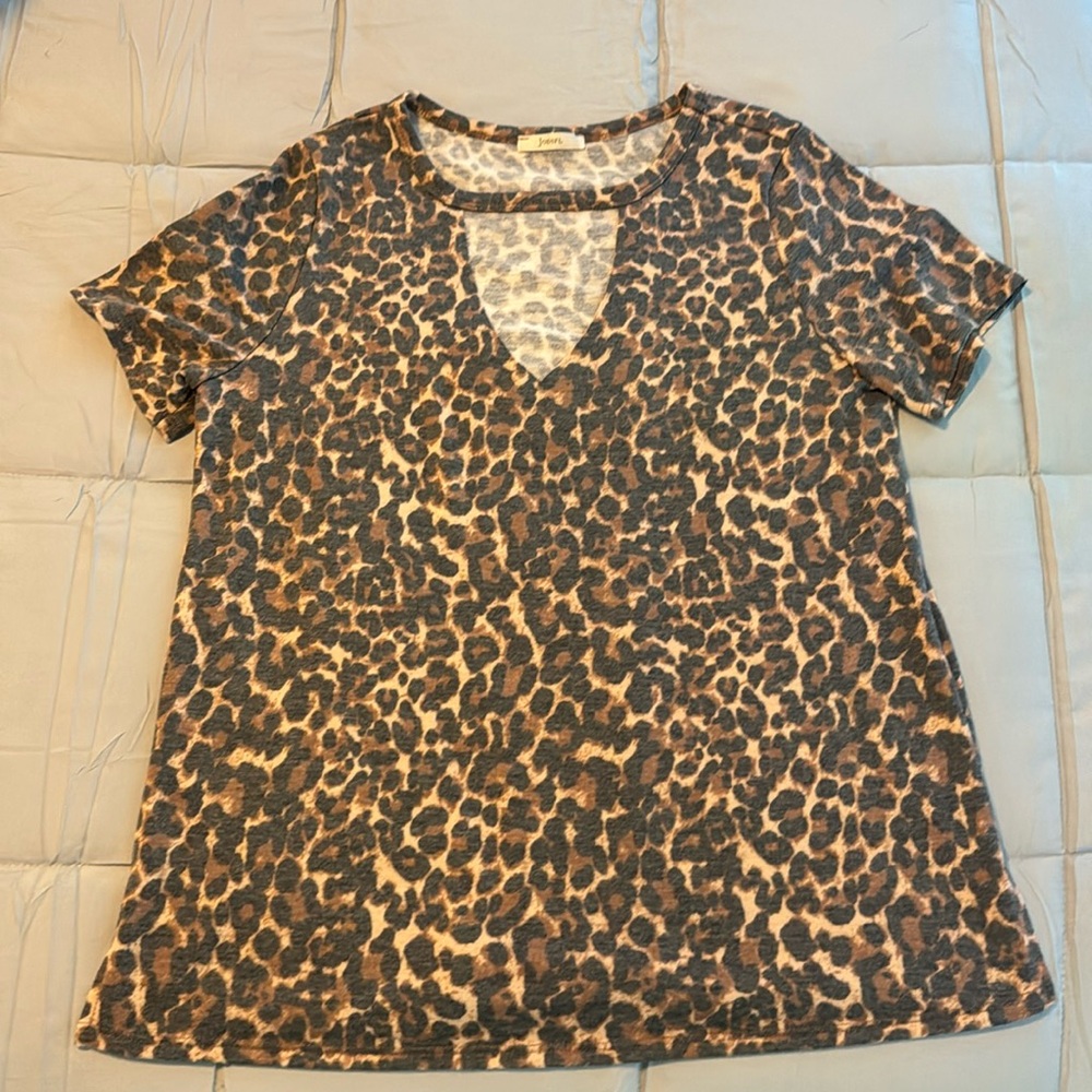 A gorgeous Jodifl leopard print shirt. This shirt has a v-shaped neck cut out!